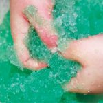 child playing with jelly