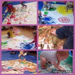 children making art with edible paint