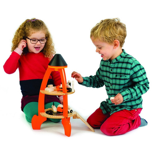 children playing with cosmic rocket toy