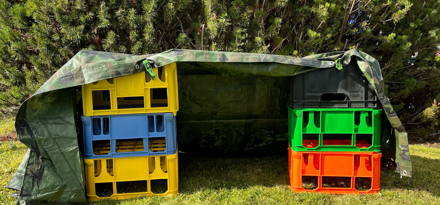 kids den made using milk crates and camo fabric