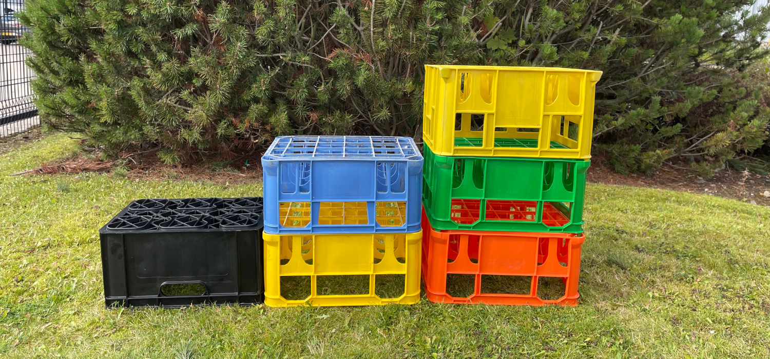 milk crates stacked on top of eachother