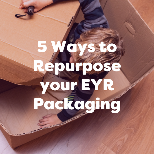 child repurposing cardboard box for play