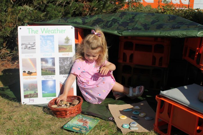 child in a den 