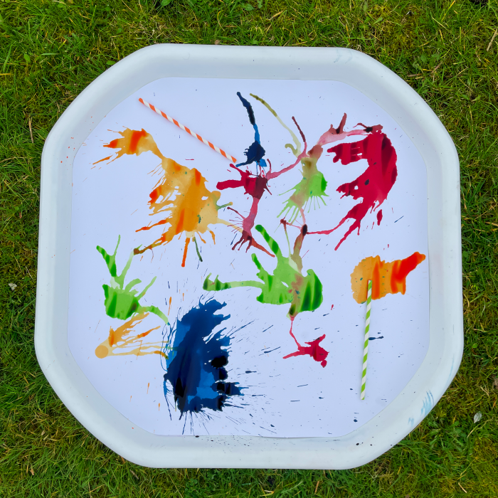 tuff tray with paint splatters